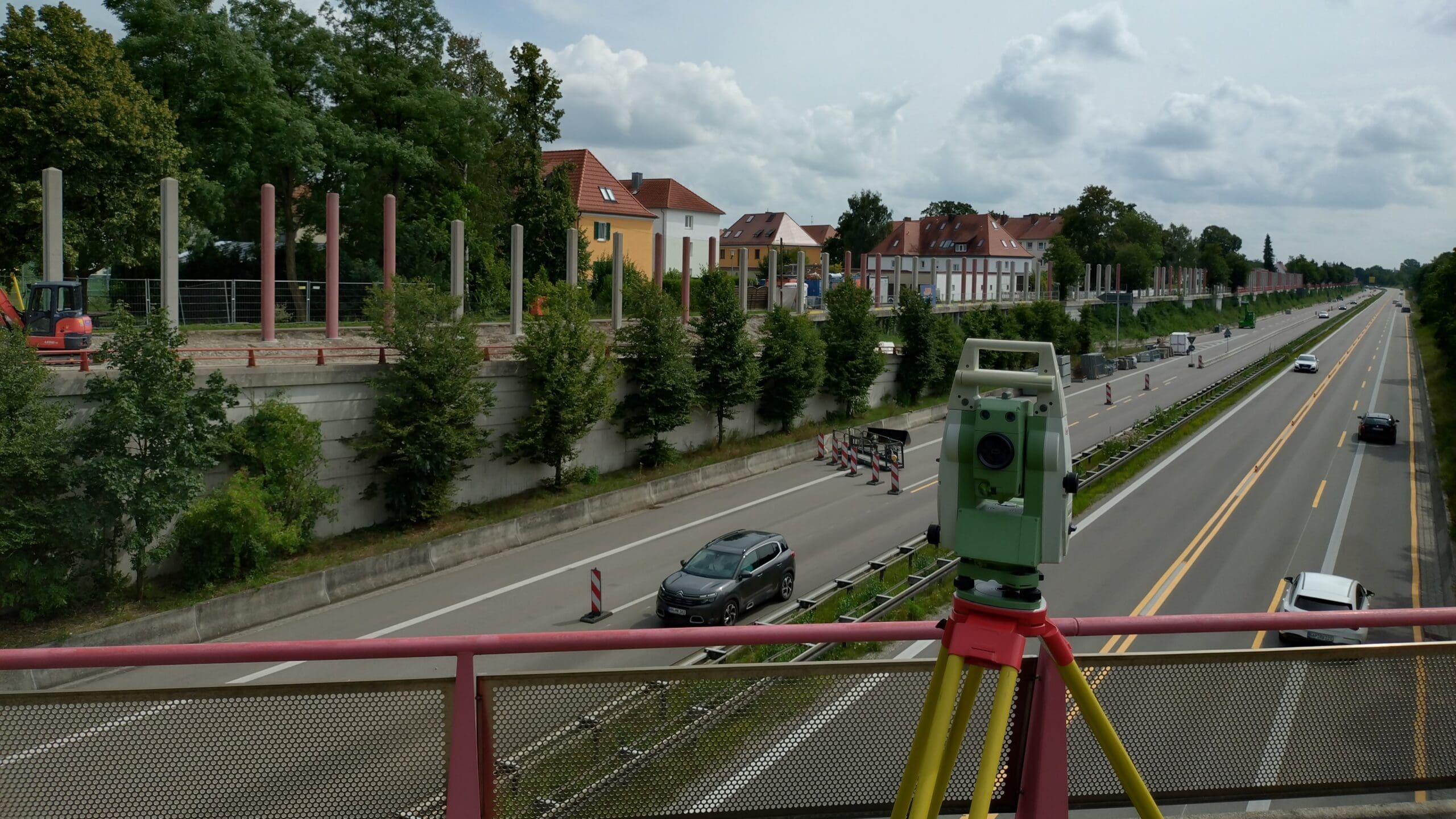 Total station set up on bridge for structural survey services Sydney