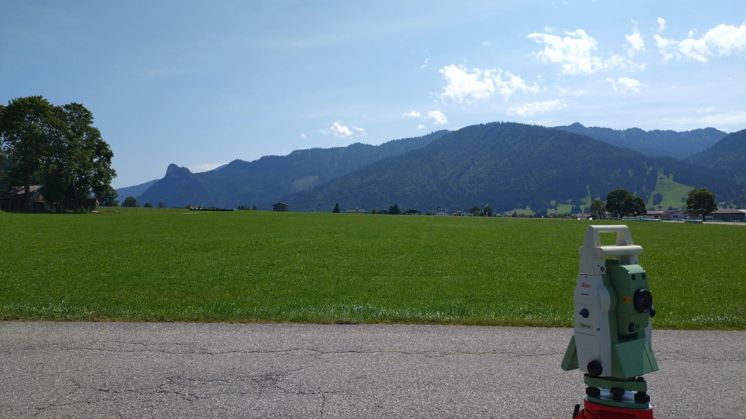 Total station for land surveying services in scenic landscape