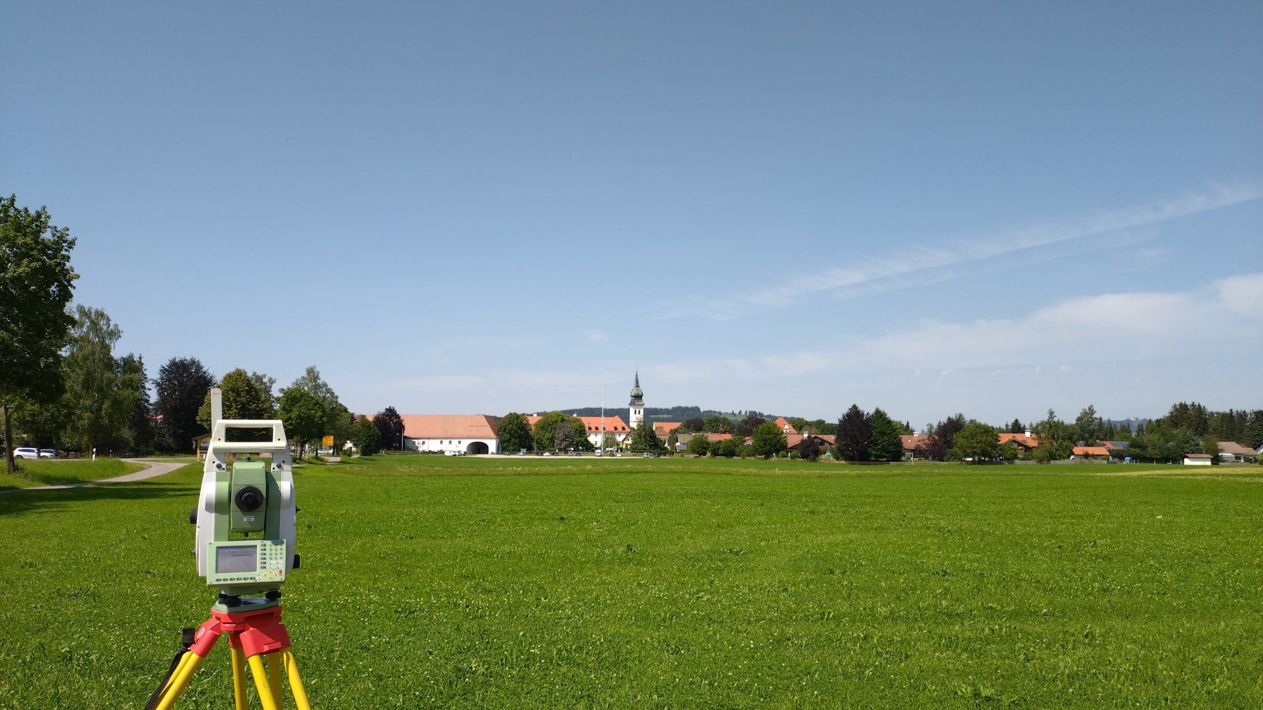 Total station on tripod for land survey services